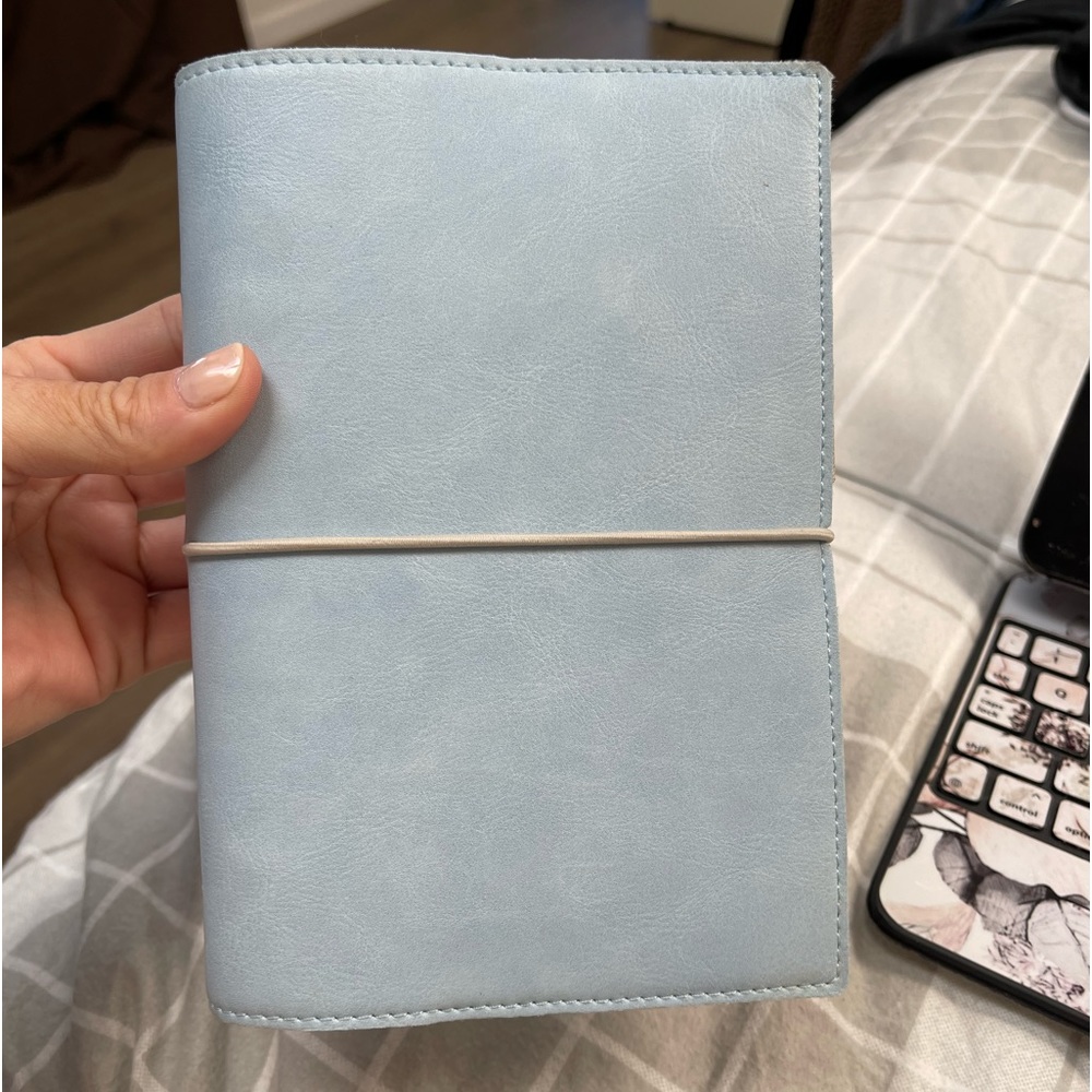 Personal size Filofax in light blue used twice